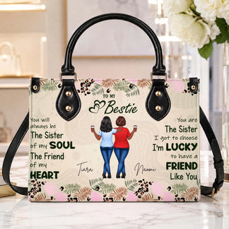 Elegant personalized best friend handbag with an illustration of two friends, custom names, and floral accents.