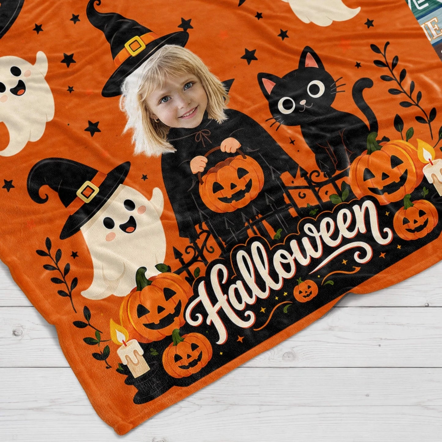 Warm custom Halloween blanket for kids featuring a personalized photo, pumpkins, and ghosts for a festive autumn gift.
