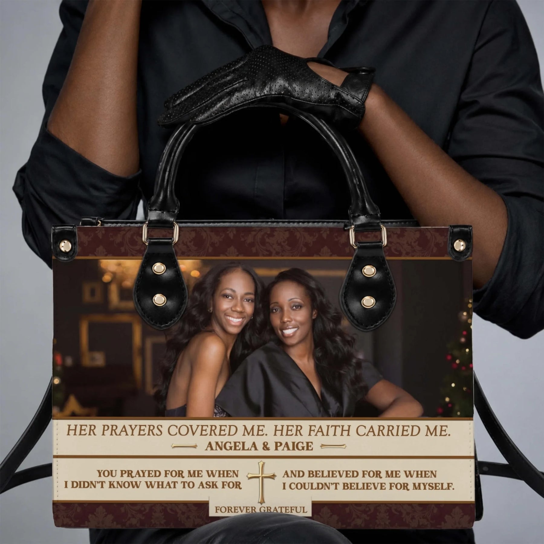 Woman holding a custom photo PU leather handbag featuring a heartfelt tribute message and religious cross design.