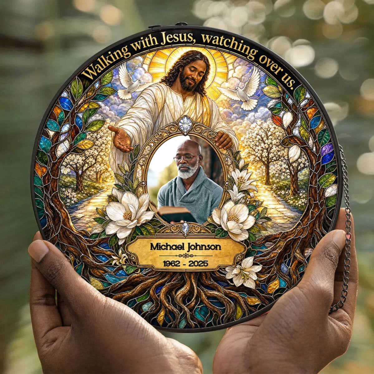 Round stained glass memorial suncatcher displaying a personalized photo, memorial dates, and an illustration of Jesus Christ.