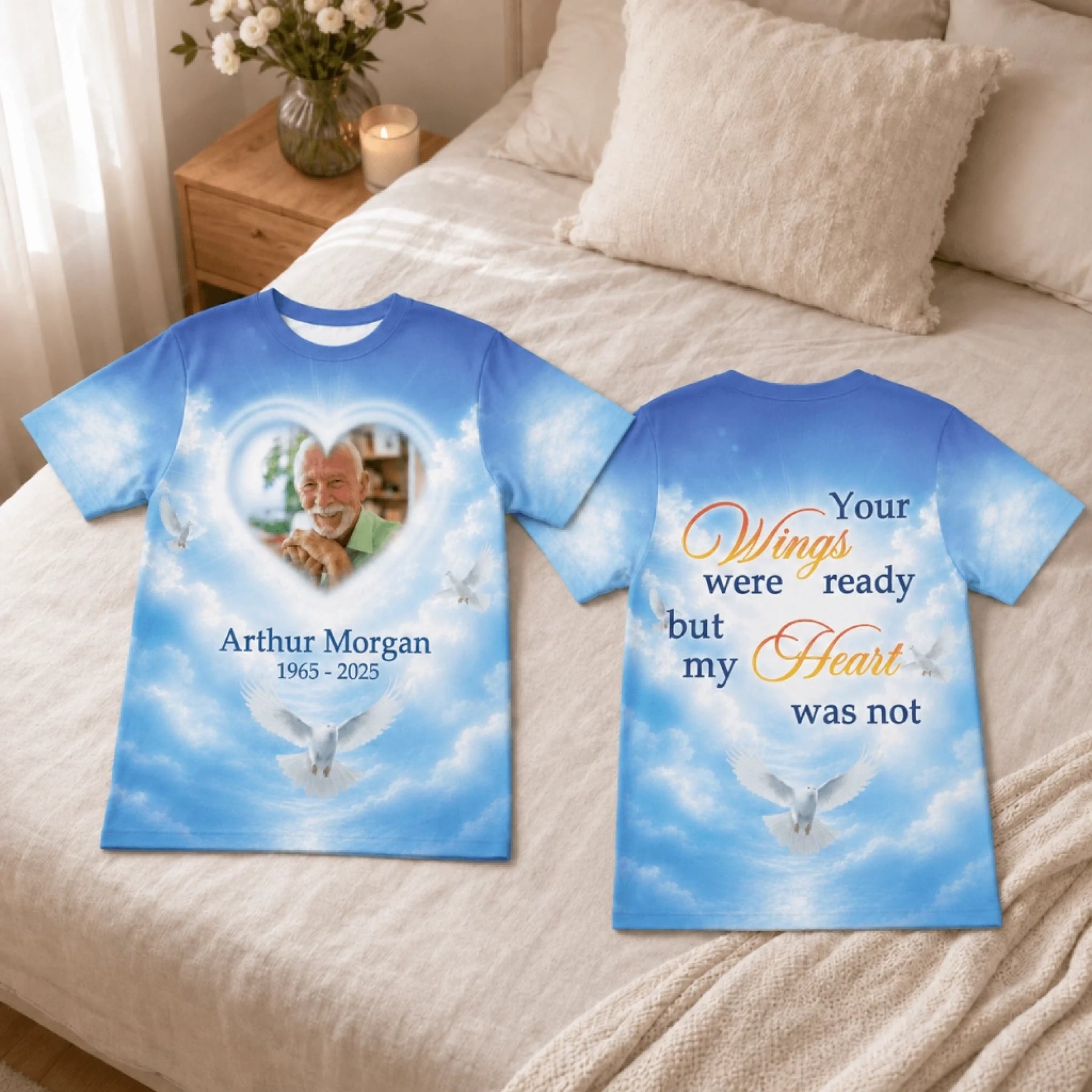 Personalized memorial t-shirt showing a photo frame design, blue sky with white doves, and commemorative text.