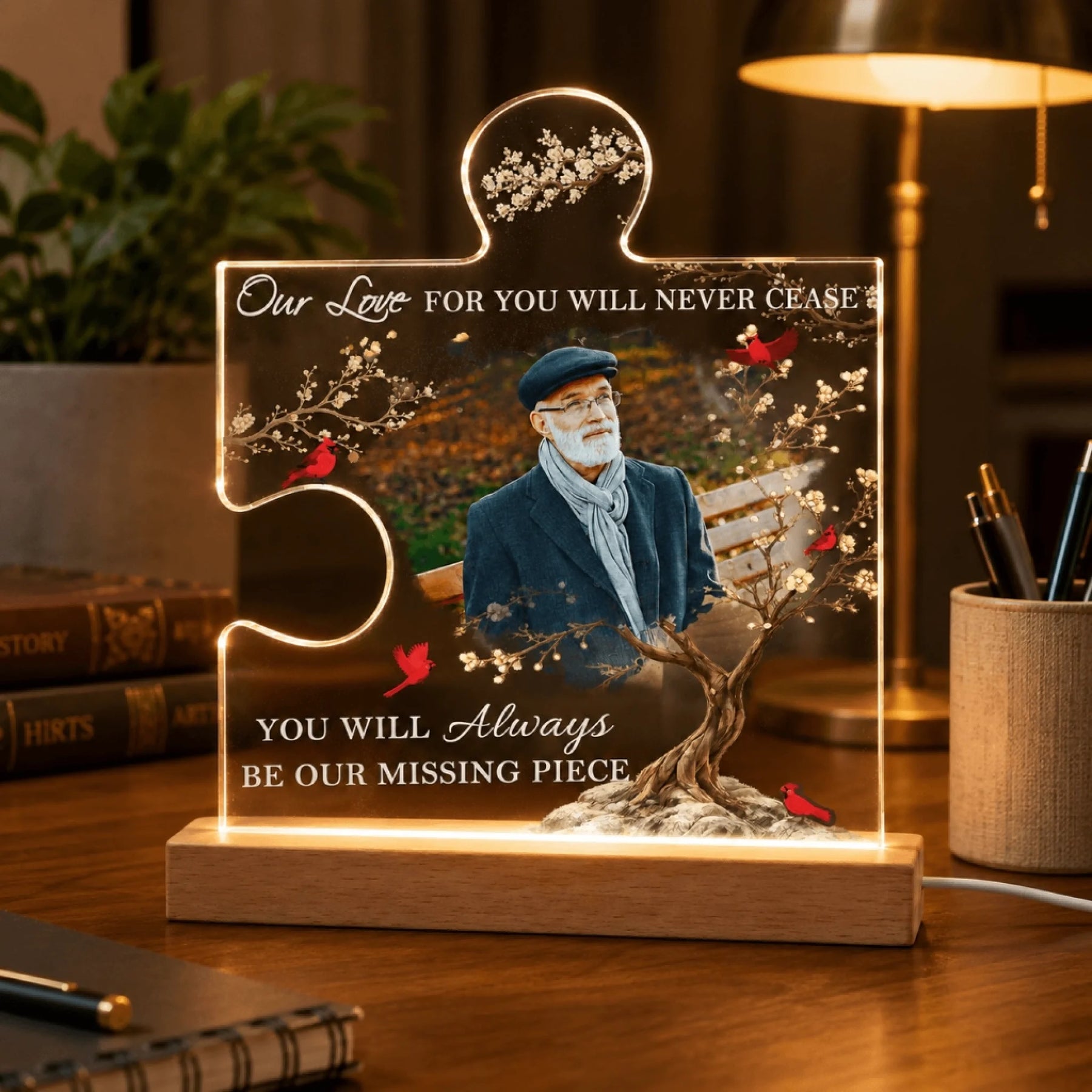 Personalized memorial keepsake night light in a puzzle piece shape, featuring a photo of a man and cardinal bird decor.