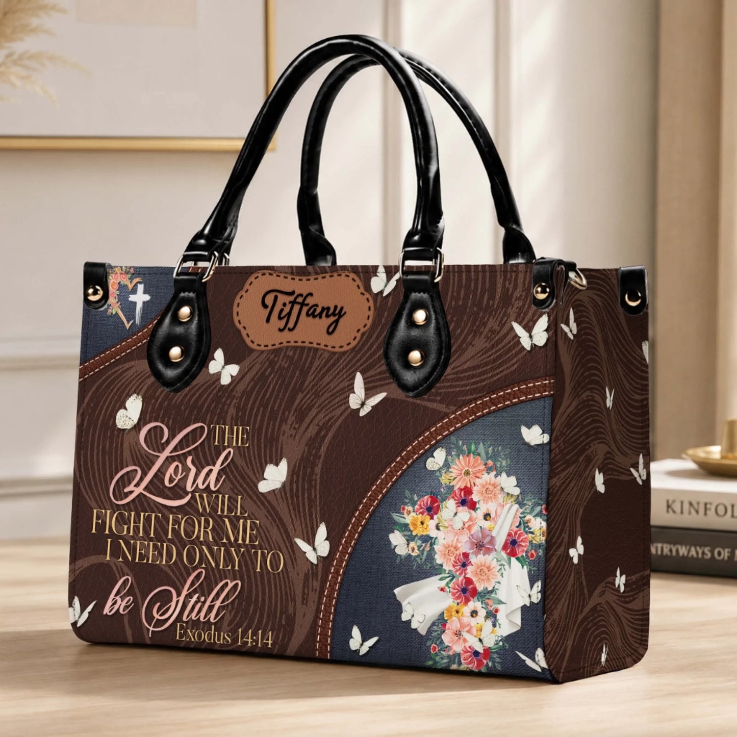 Personalized PU leather handbag with floral design, butterflies, and the bible verse Exodus 14:14 for a religious gift.