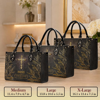 Three sizes of a black leather handbag displayed with a golden cross design and Amari custom text for faith gifts