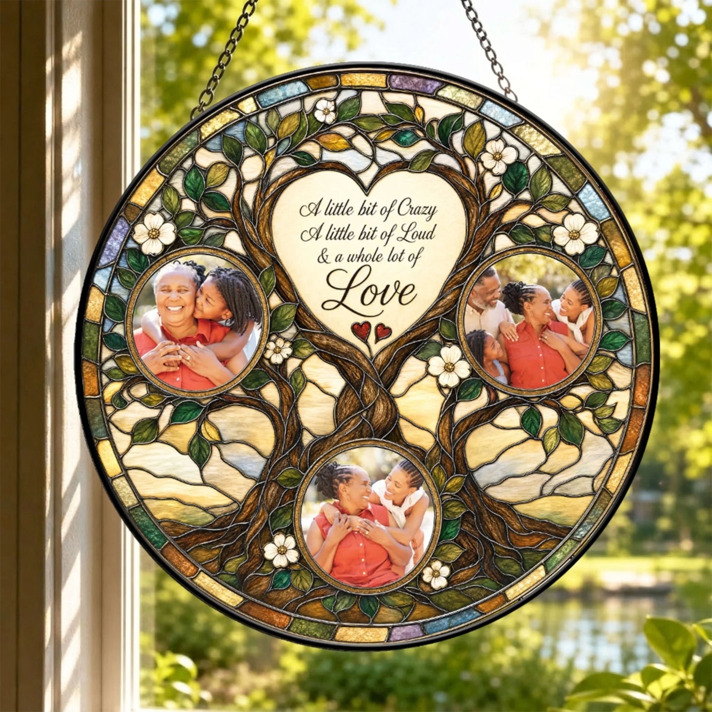 Round stained glass family tree suncatcher customized with three photos and a beautiful quote hanging in a window