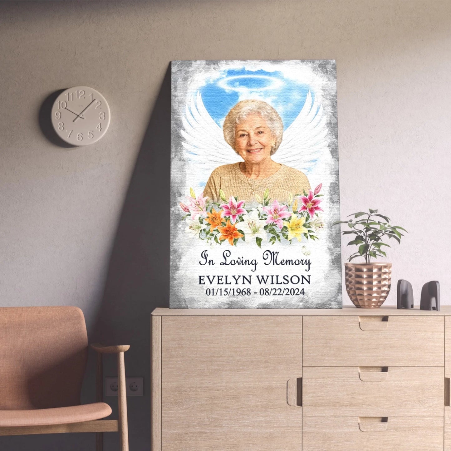 Custom sympathy wall canvas with angel wings and floral accents, designed as a beautiful memorial gift for a loss.