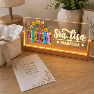Personalized LED teacher lamp next to a thank you note, featuring a floral book design for teacher appreciation day.