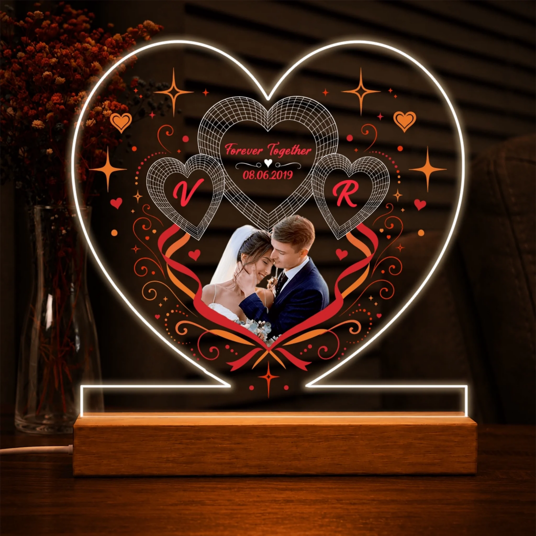 Personalized heart shaped LED light for couples showing a bride and groom photo with custom initials and wedding date.