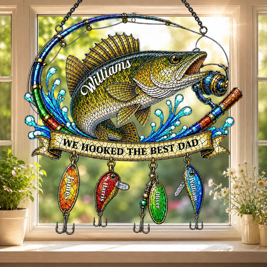 Decorative stained glass panel with a fish and fishing lures, featuring the text 'We hooked the best dad'.