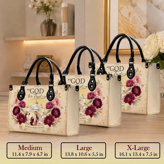 Display of personalized floral handbags with In God We Trust design available in medium large and extra large size options.