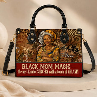 Front view of a personalized Black Mom Magic shoulder bag featuring custom name text as a thoughtful gift