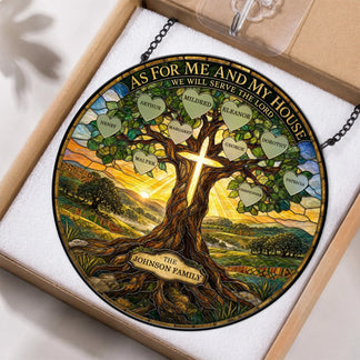 Personalized stained glass tree of life suncatcher with names in heart shapes and a cross, packaged securely in a gift box.