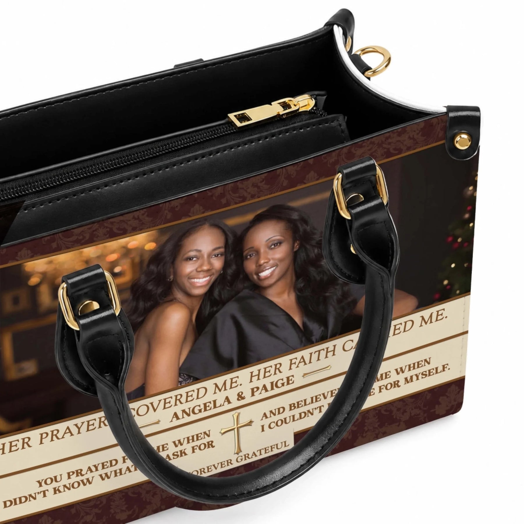 Close up of a custom leather handbag featuring a personal photo and religious text design