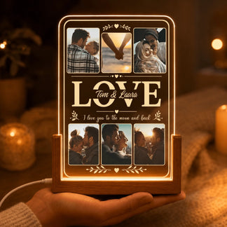 Handheld personalized LED acrylic light frame featuring custom couple photos and the message I love you to the moon.