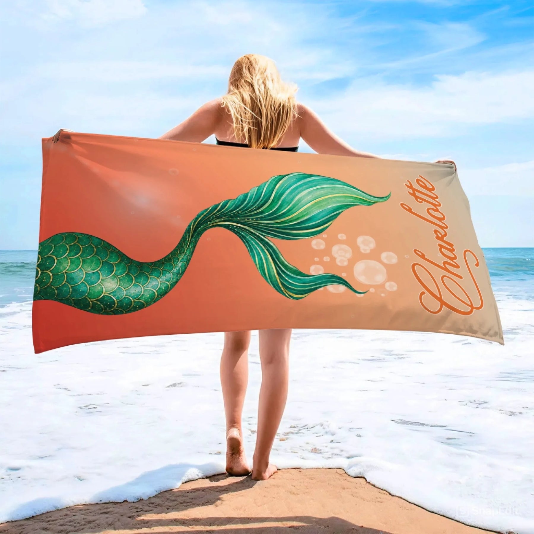 Personalized mermaid tail beach towel customized with the name Charlotte, perfect for girls who love the ocean theme.