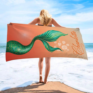 Personalized mermaid tail beach towel customized with the name Charlotte, perfect for girls who love the ocean theme.