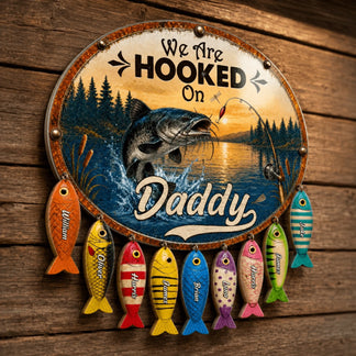 Decorative sign with fishing theme and colorful fish names on a wooden background
