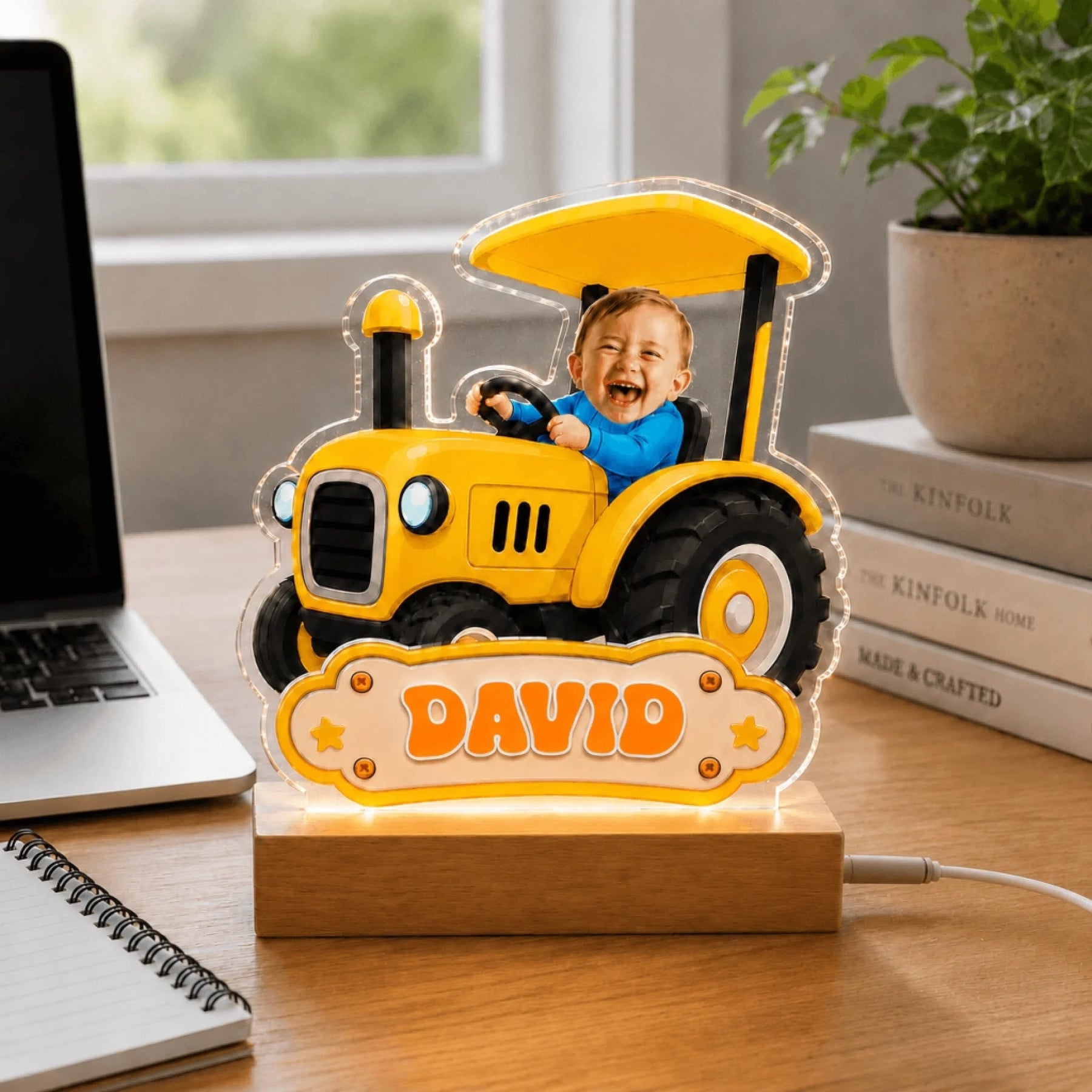Desktop personalized tractor lamp with custom photo of a baby boy named David, ideal birthday gift for toddlers.