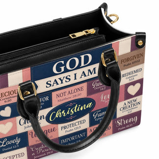 Close-up of a personalized Christian handbag showing detailed Bible verse text and high-quality leather construction.