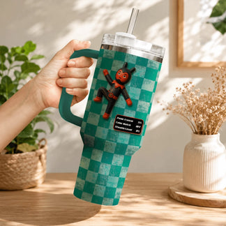 Custom gaming tumbler featuring a devil character and UI stats on a teal checkered stainless steel cup