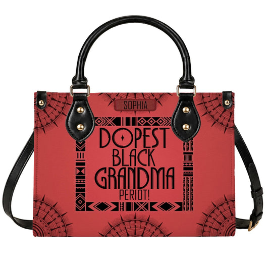 A red personalized handbag featuring the text Dopest Black Grandma Period and the name Sophia with black tribal accents.