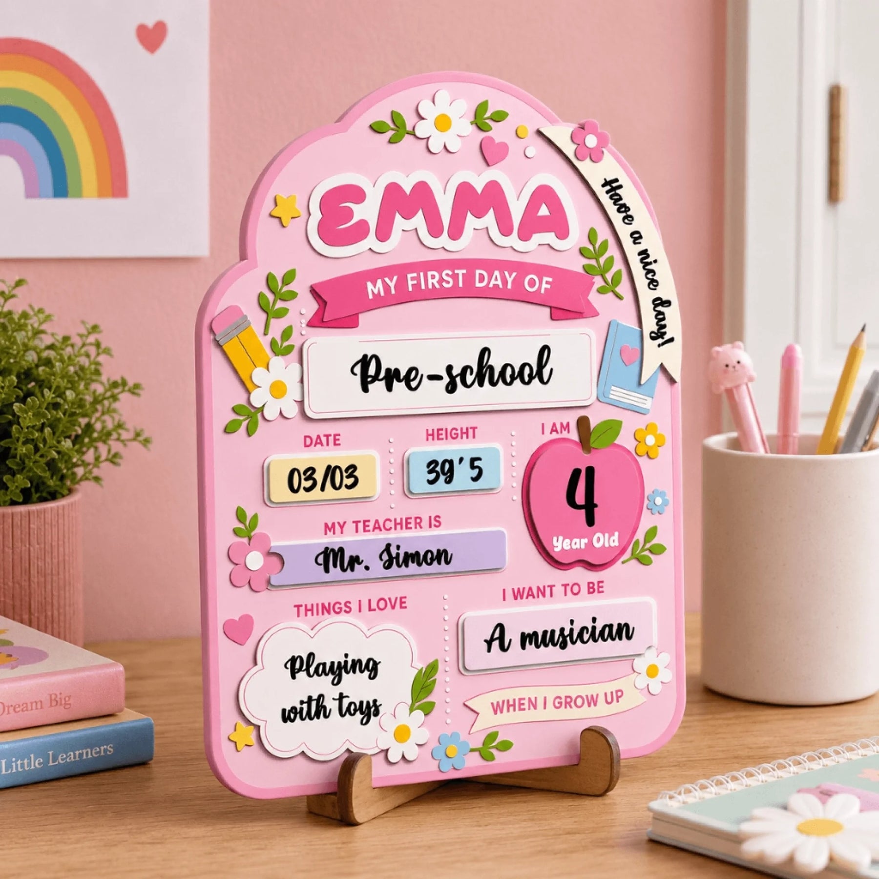 Personalized wooden first day of preschool sign with name Emma, date, height, teacher name, and future career goals.