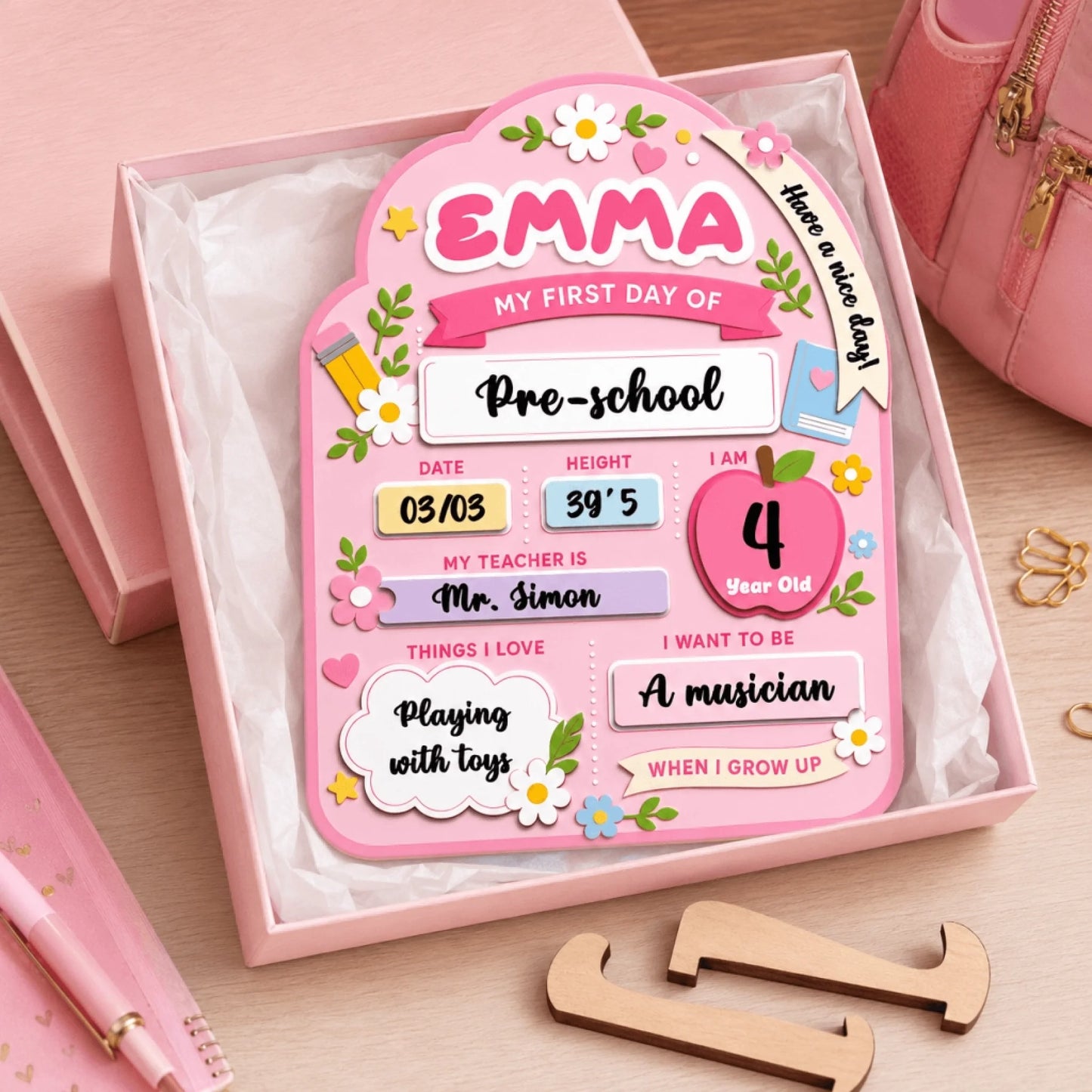 Personalized wooden first day of preschool sign with name Emma, date, height, teacher name, and future career goals.