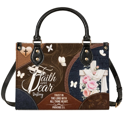 Christian tote bag featuring a floral cross design and Faith Over Fear quote from Proverbs 3:5 for faith-based gifts.