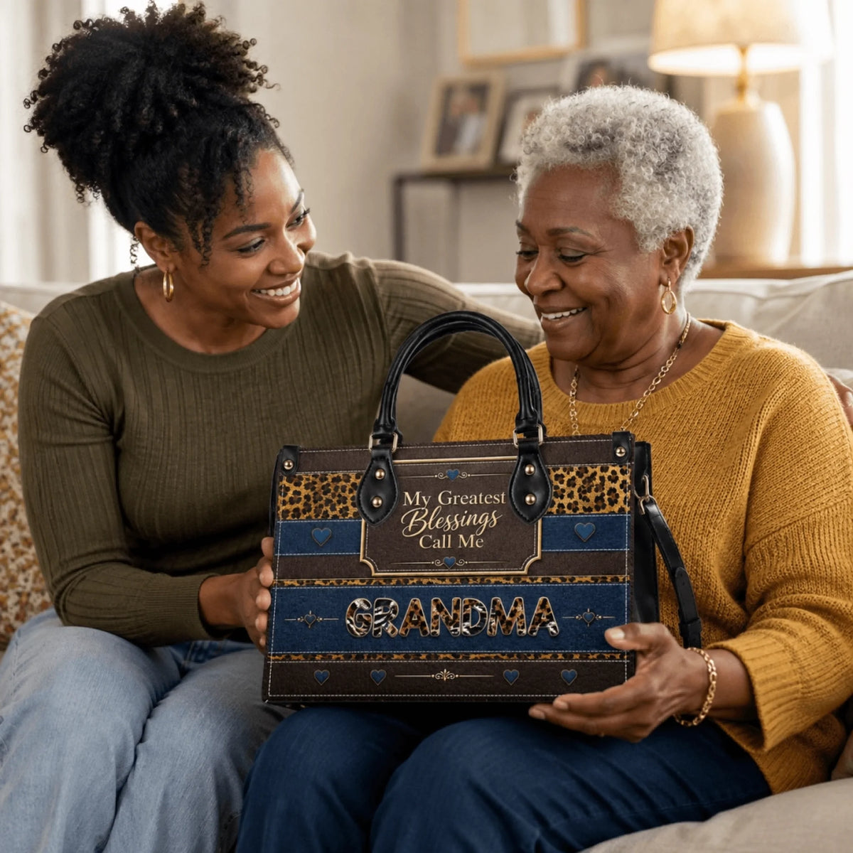 A woman presenting a personalized leopard print tote bag to an older woman as a thoughtful grandma gift.