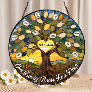 Personalized family tree stained glass suncatcher with custom names displayed on a table near white daisies.