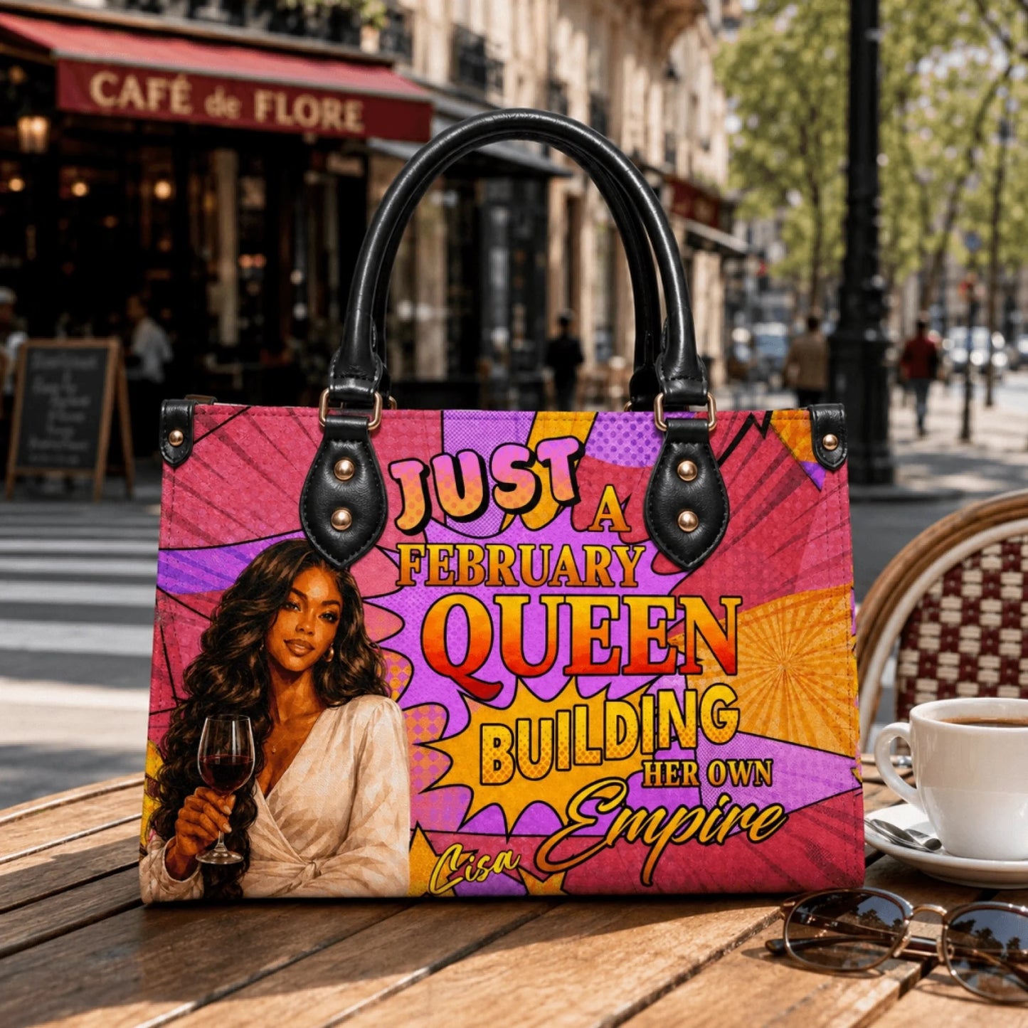 A personalized handbag featuring the text February Queen and a custom name, perfect as a birthday gift for her.