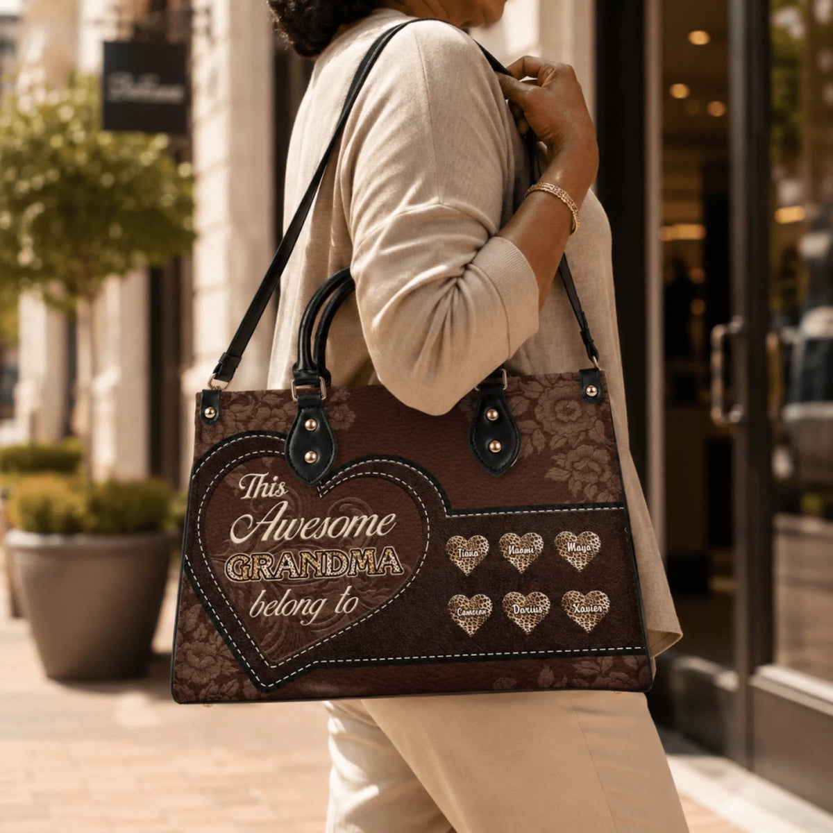 Fashionable brown floral print handbag with custom engraved hearts and names, perfect gift for an awesome grandma.