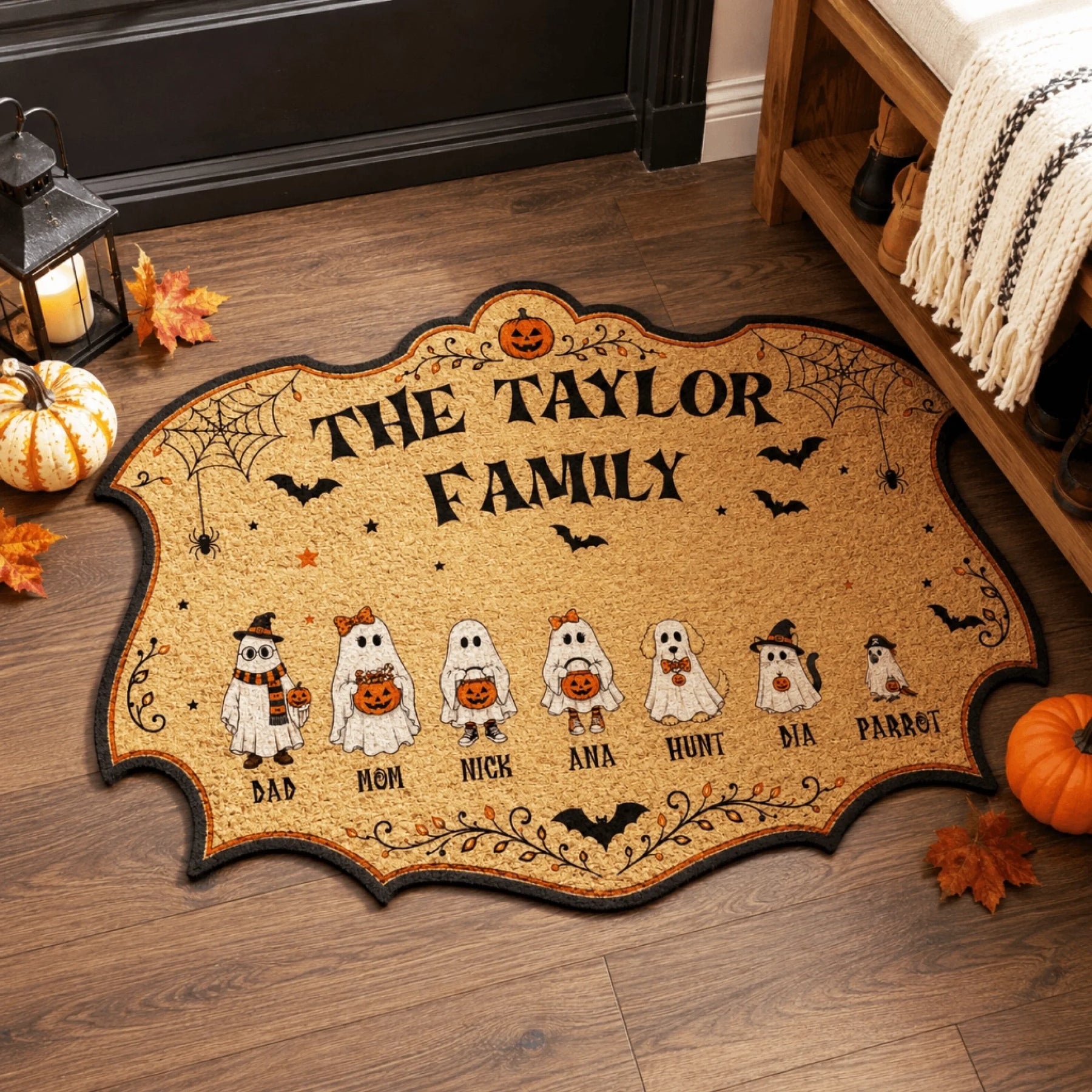 Decorative Halloween front door mat personalized with names for the Taylor family including ghost kids and pets.