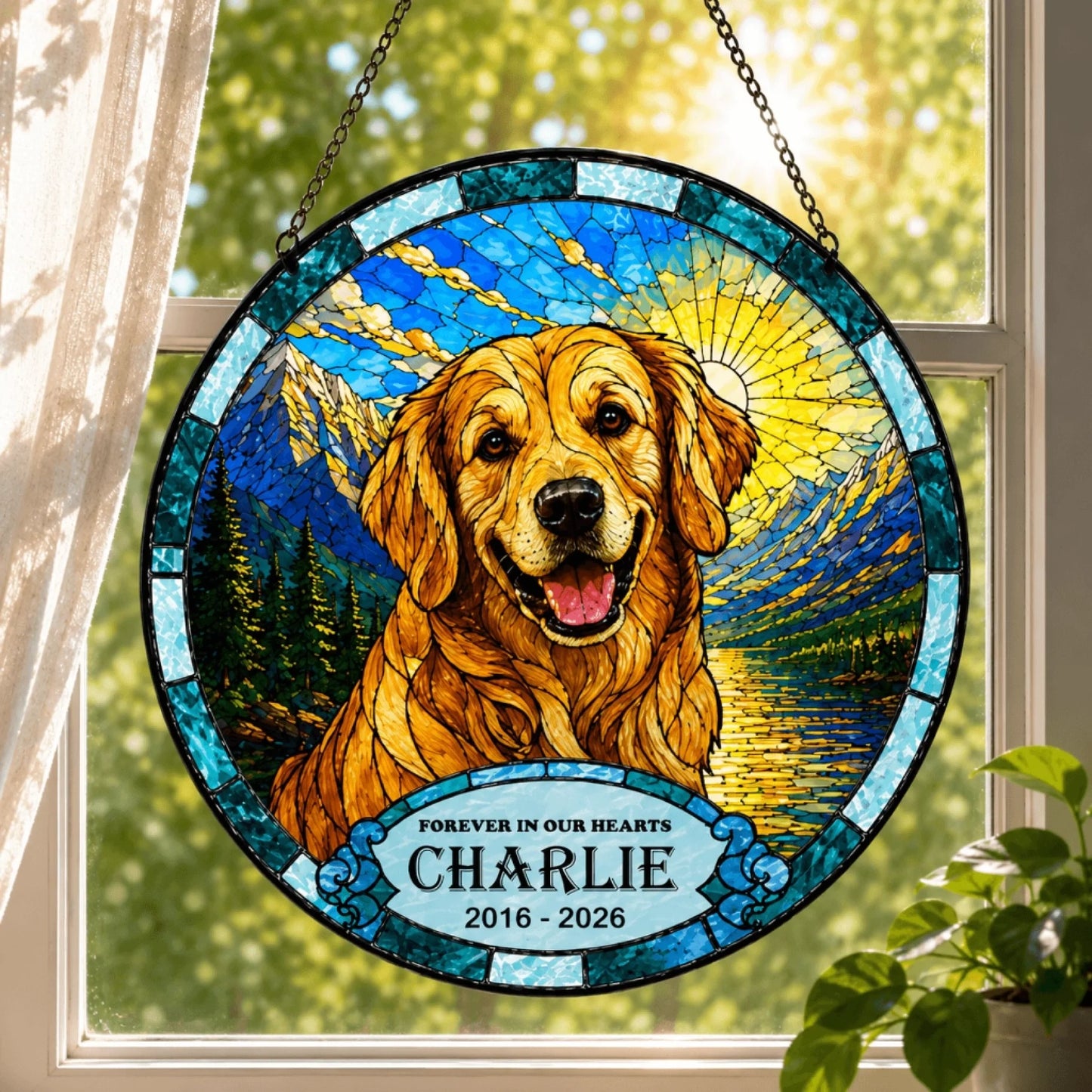 Personalized pet sympathy gift suncatcher with a golden retriever design and custom memorial dates hanging in a window.