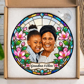 Customized stained glass acrylic suncatcher featuring a grandmother and granddaughter, packaged for gift giving.