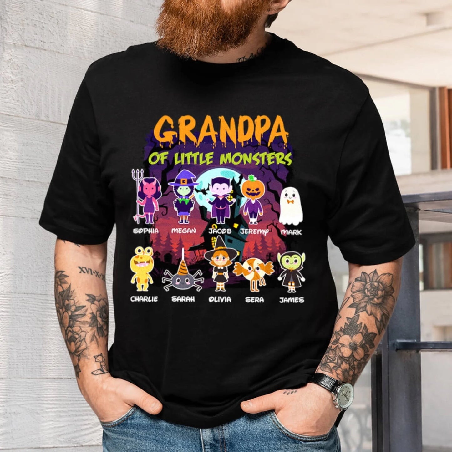 A black Halloween T-shirt for grandpa featuring custom names for 10 little monsters in cute monster character costumes.