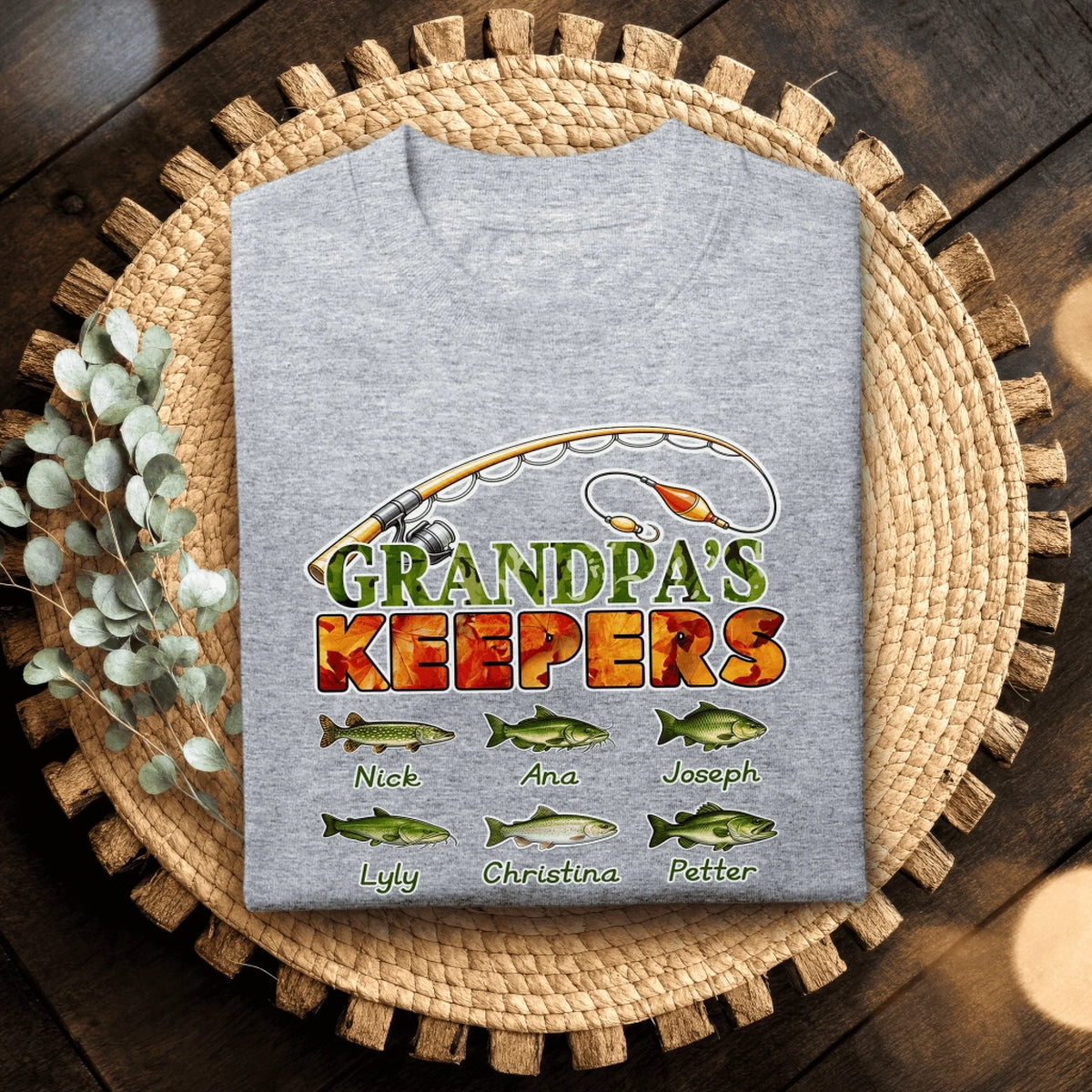 Personalized fishing themed t-shirt for grandpa featuring custom names of six grandchildren and various fish illustrations.