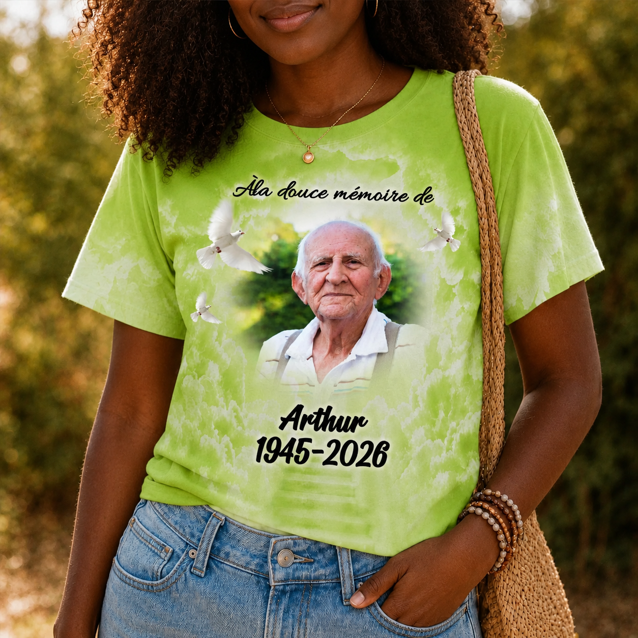 Green custom memorial T-shirt worn by a person featuring a photo of a loved one and sentimental heaven tribute text.