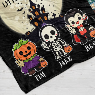 Halloween gift for Grandma featuring a haunted house design and personalized names Tim Jake and Ben on a soft fleece blanket.