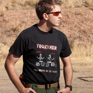 A black t shirt featuring a skeleton couple illustration with custom names Robert and Sophia, suitable for halloween or anniversary gifts.