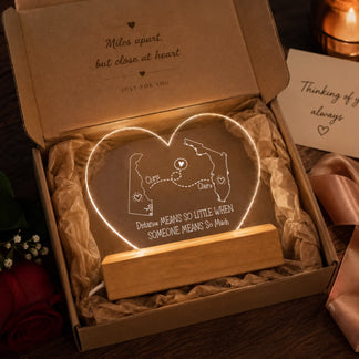 heart shaped personalized long distance lamp inside a gift box