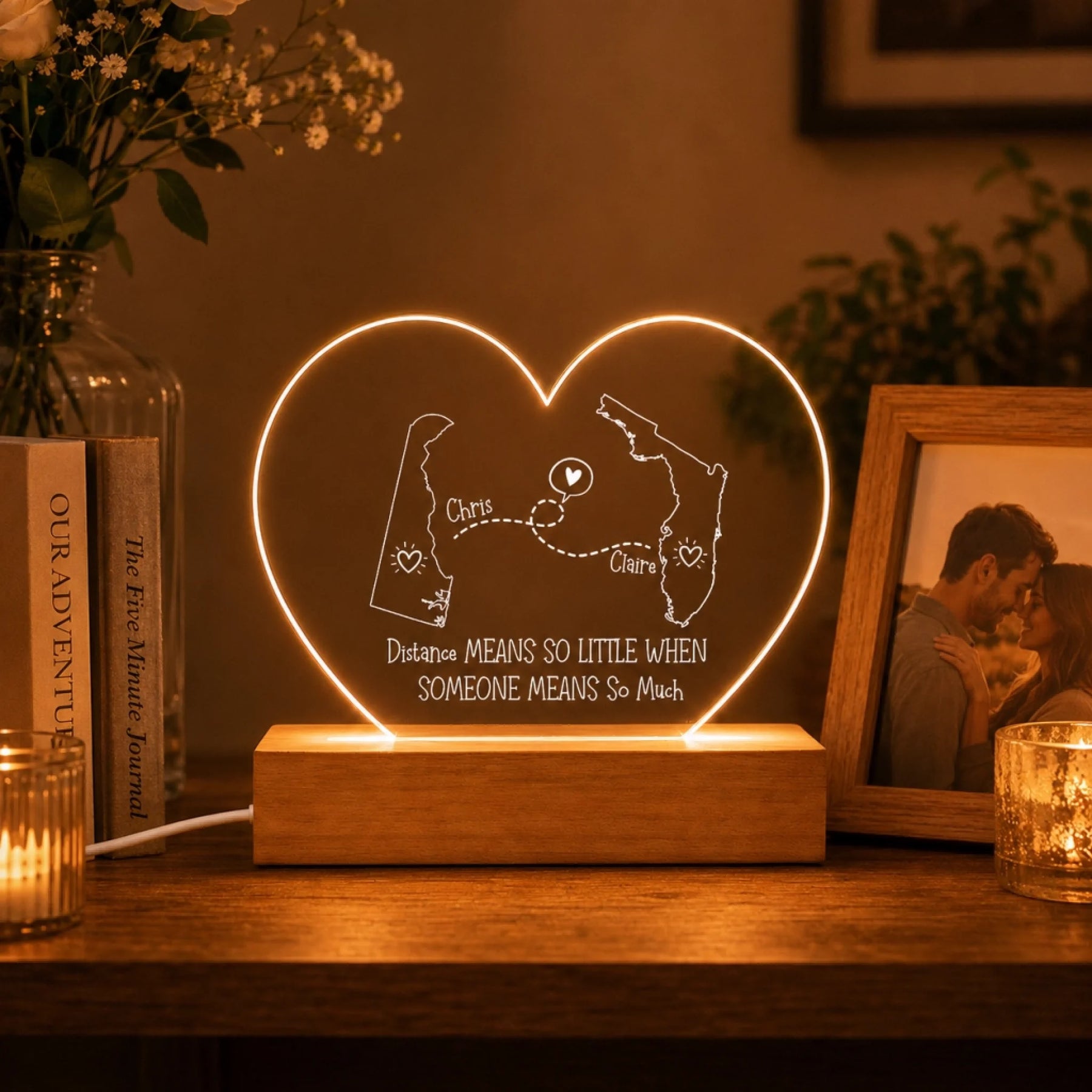 round custom acrylic light placed next to a gift box and card