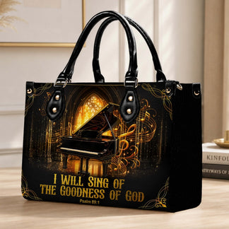Black piano themed handbag with Psalm 89 1 quote and gold musical notes, perfect for church or faith-based gifts.