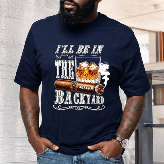 Custom men’s t-shirt featuring a whiskey and cigar design with the personalized name Joseph, perfect for backyard relaxation.