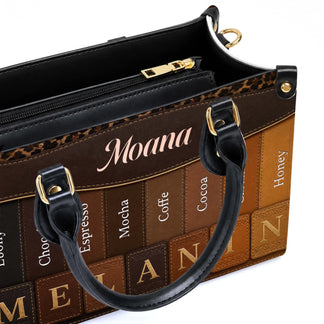Interior view of a personalized Moana handbag with a leopard print trim and organized compartments for daily use.