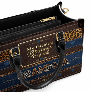 Interior view of a personalized Grandma handbag with leopard print and denim design showing the zippered main compartment.