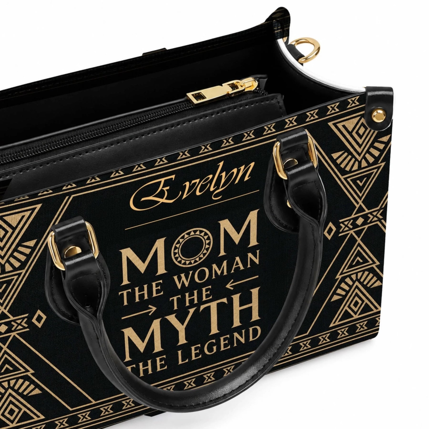 Inside view of a black and gold personalized handbag with a zipped compartment for a custom mom gift accessory.
