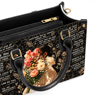 Top view of a personalized floral leopard print tote bag showing the organized interior for carrying daily belongings.