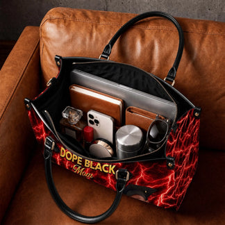 The spacious interior of a custom printed handbag featuring family photos and a Dope Black Mom quote, filled with daily essentials.
