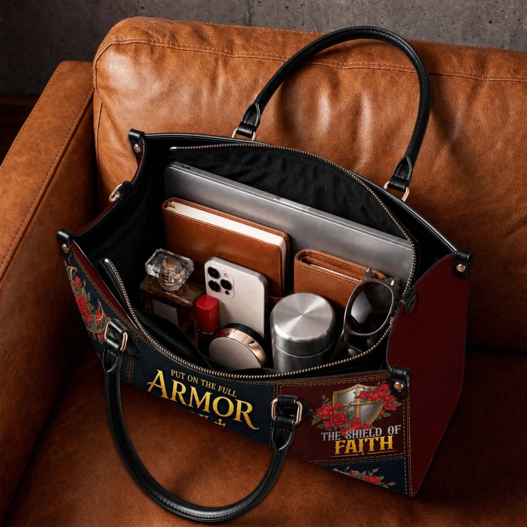 Interior view of a personalized Armor of God leather handbag showing spacious storage for daily essentials.